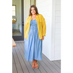 Feel the southern breeze in our Carolina My Mind Midi Dress! This lightweight denim dress features a smocked bust line