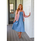 Feel the southern breeze in our Carolina My Mind Midi Dress! This lightweight denim dress features a smocked bust line