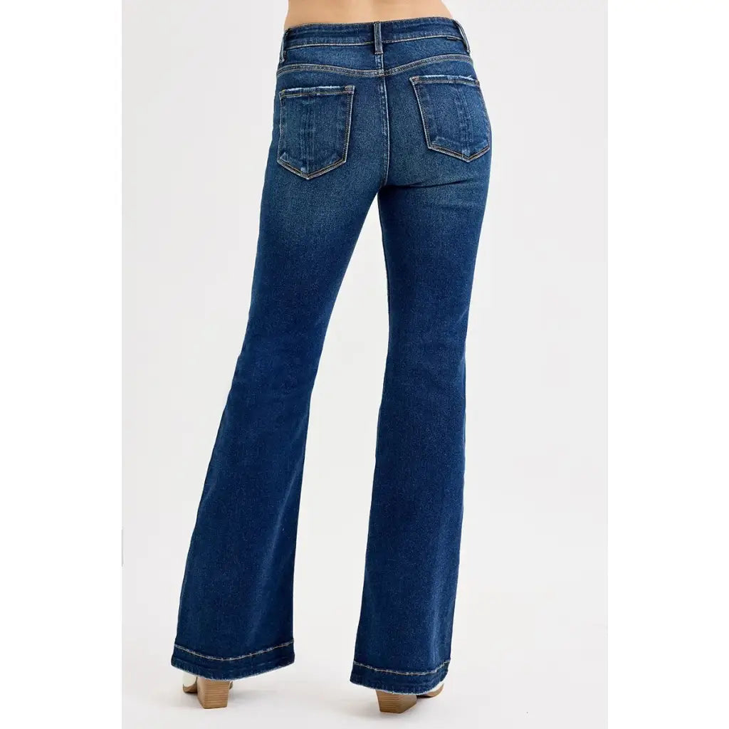 Flattering tummy control mid rise flare jeans by RISEN. Slight stretch leg-lengthening silhouette plus size friendly.
