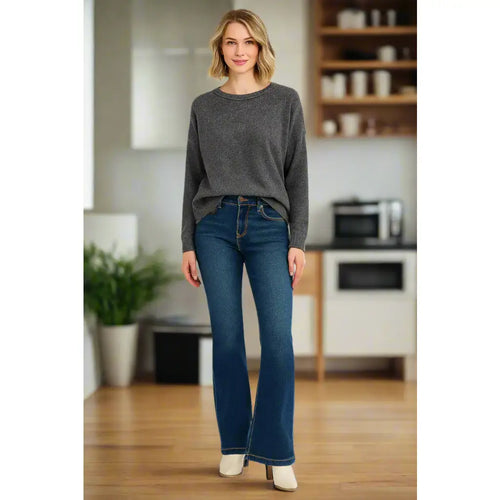 Flattering tummy control mid rise flare jeans by RISEN. Slight stretch leg-lengthening silhouette plus size friendly.
