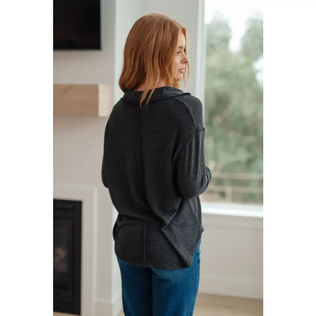 Cozy charcoal long sleeve top with thumb holes and v-neck. Relaxed fit available in plus sizes. Boutique comfy