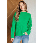 Green checkered boutique sweater with luxe knit and ribbed trim. Plus sizing available. Style it casual or chic.