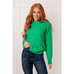 Green checkered boutique sweater with luxe knit and ribbed trim. Plus sizing available. Style it casual or chic.