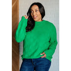 Green checkered boutique sweater with luxe knit and ribbed trim. Plus sizing available. Style it casual or chic.