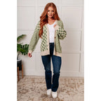 Stay cozy and stylish in our Check the Stripes Knit Cardigan Olive. This versatile piece features a flattering