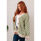 Stay cozy and stylish in our Check the Stripes Knit Cardigan Olive. This versatile piece features a flattering