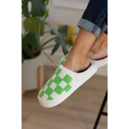 Step your way into comfort with these Checked Out Slippers in green and white. Crafted from a warm fuzzy looped French