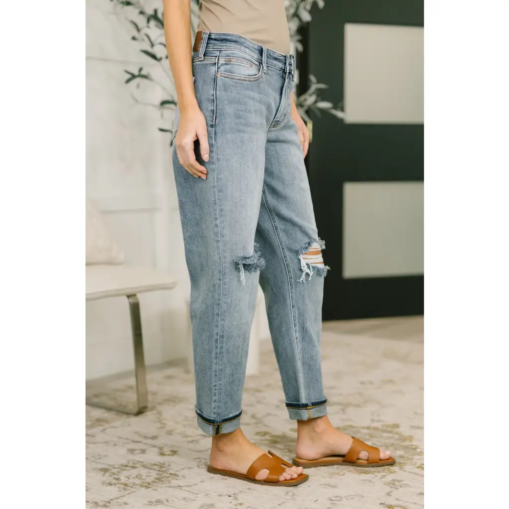Shop Judy Blue boyfriend jeans with stretch comfort and flattering mid rise fit. Available in standard plus sizes