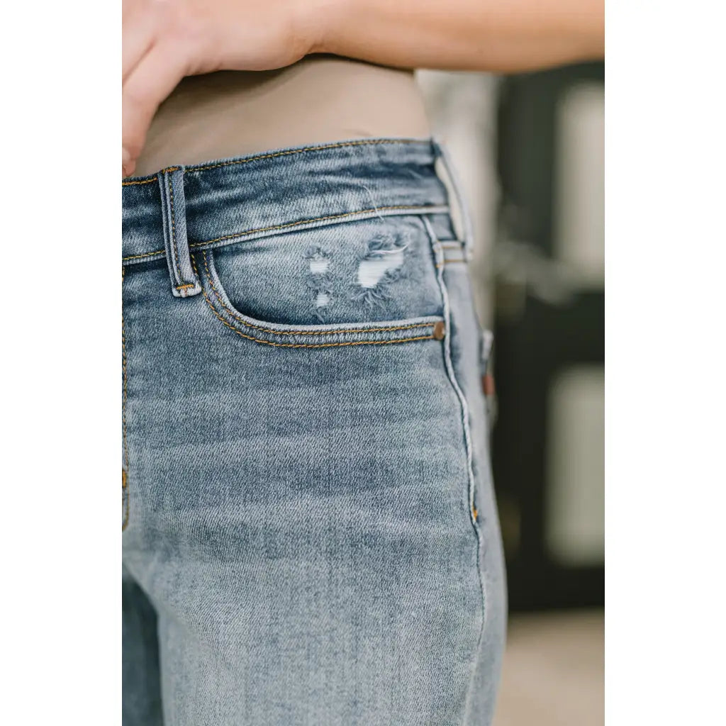 Shop Judy Blue boyfriend jeans with stretch comfort and flattering mid rise fit. Available in standard plus sizes
