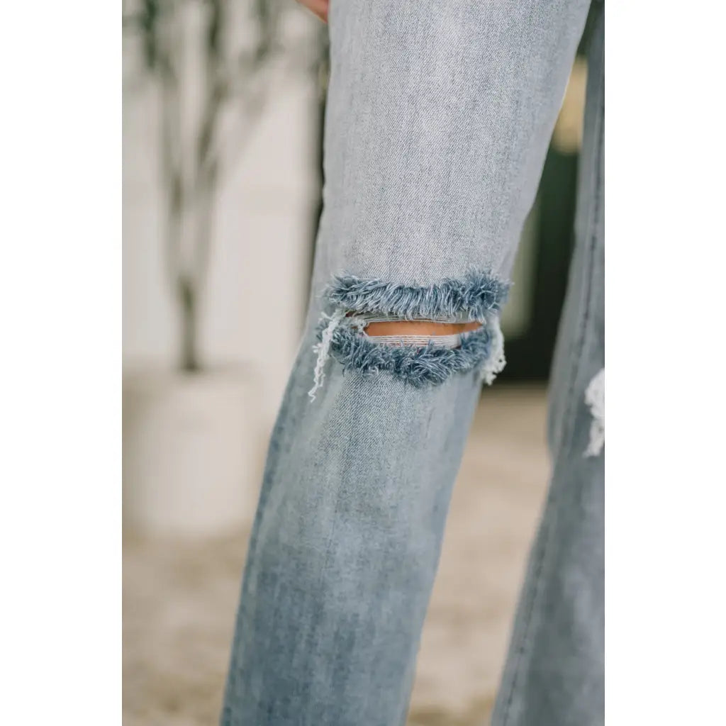 Shop Judy Blue boyfriend jeans with stretch comfort and flattering mid rise fit. Available in standard plus sizes