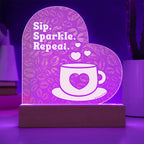 Add sparkle to your coffee bar with this heart-shaped LED acrylic plaque! A bold gift for lovers besties or boutique