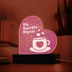 Add sparkle to your coffee bar with this heart-shaped LED acrylic plaque! A bold gift for lovers besties or boutique