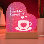 Add sparkle to your coffee bar with this heart-shaped LED acrylic plaque! A bold gift for lovers besties or boutique