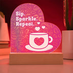 Add sparkle to your coffee bar with this heart-shaped LED acrylic plaque! A bold gift for lovers besties or boutique