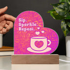 Add sparkle to your coffee bar with this heart-shaped LED acrylic plaque! A bold gift for lovers besties or boutique