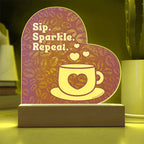 Add sparkle to your coffee bar with this heart-shaped LED acrylic plaque! A bold gift for lovers besties or boutique