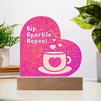 Add sparkle to your coffee bar with this heart-shaped LED acrylic plaque! A bold gift for lovers besties or boutique