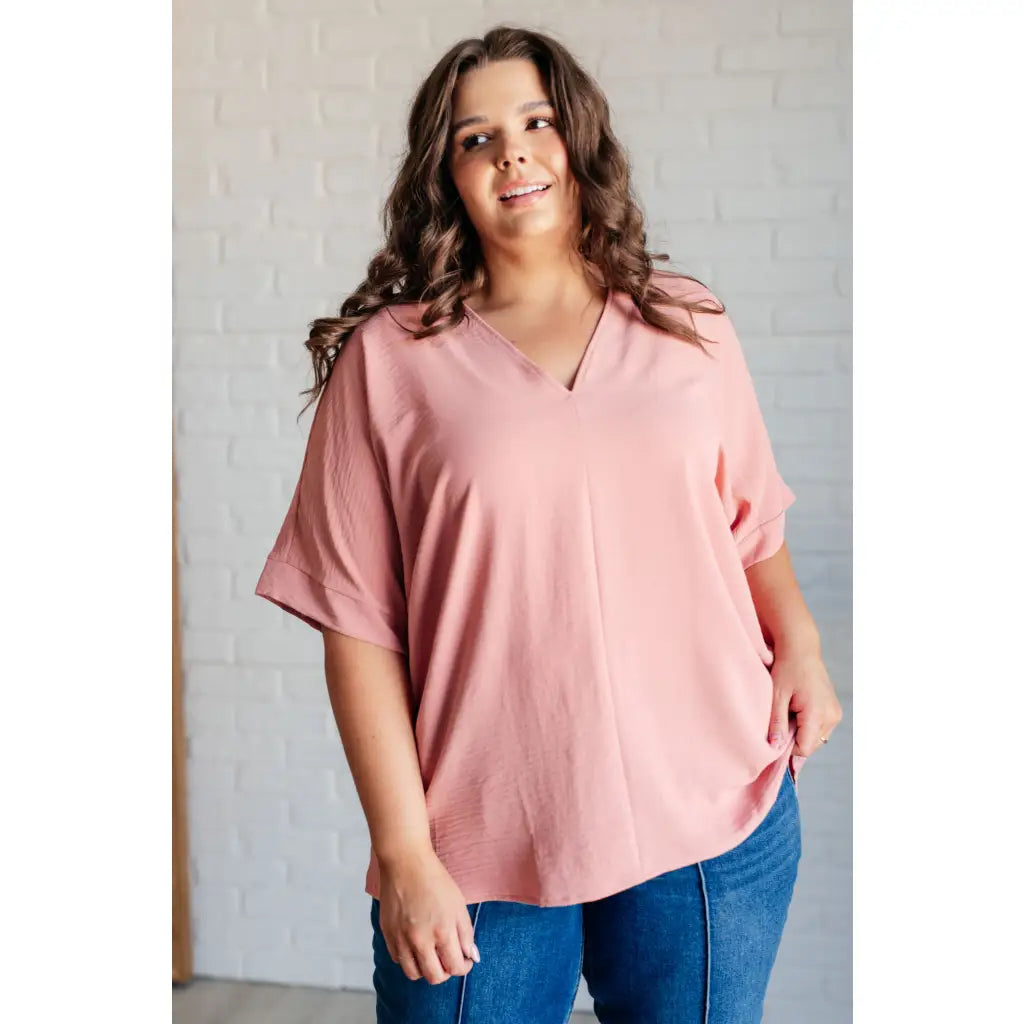 Our Contrary to Popular Belief V-Neck Blouse is a testament effortless style. Crafted from crinkle woven fabric