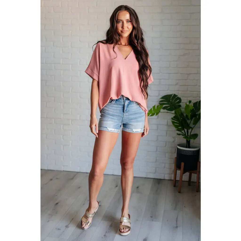 Our Contrary to Popular Belief V-Neck Blouse is a testament effortless style. Crafted from crinkle woven fabric