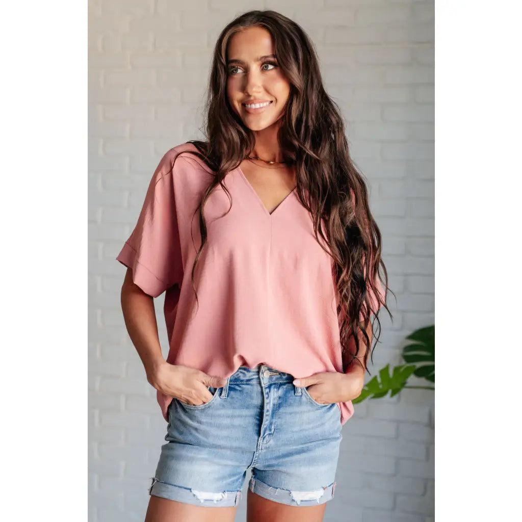 Our Contrary to Popular Belief V-Neck Blouse is a testament effortless style. Crafted from crinkle woven fabric