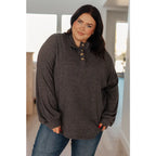 The Cozy All Over Henley Top in Cocoa is soft stylish and chic featuring a brushed ribbed knit mock neckline relaxed
