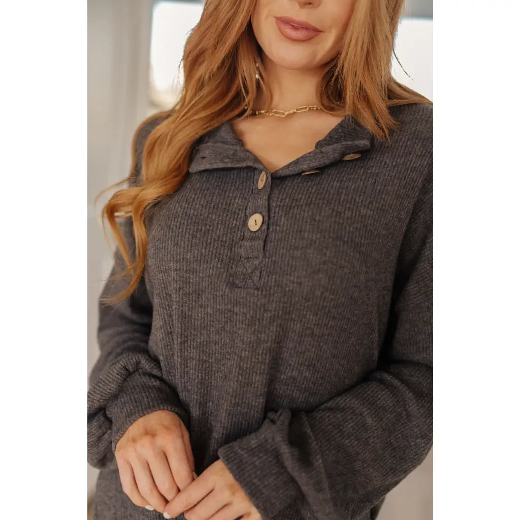 The Cozy All Over Henley Top in Cocoa is soft stylish and chic featuring a brushed ribbed knit mock neckline relaxed