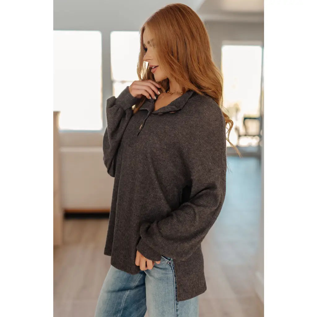 The Cozy All Over Henley Top in Cocoa is soft stylish and chic featuring a brushed ribbed knit mock neckline relaxed