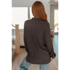 The Cozy All Over Henley Top in Cocoa is soft stylish and chic featuring a brushed ribbed knit mock neckline relaxed