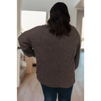 The Cozy All Over Henley Top in Cocoa is soft stylish and chic featuring a brushed ribbed knit mock neckline relaxed