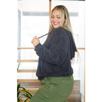 Our Cozy Does It Hoodie In Charcoal is so comfy! The coziness starts with a fuzzy medium weight knit that shapes slight