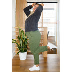 Our Cozy Does It Hoodie In Charcoal is so comfy! The coziness starts with a fuzzy medium weight knit that shapes slight