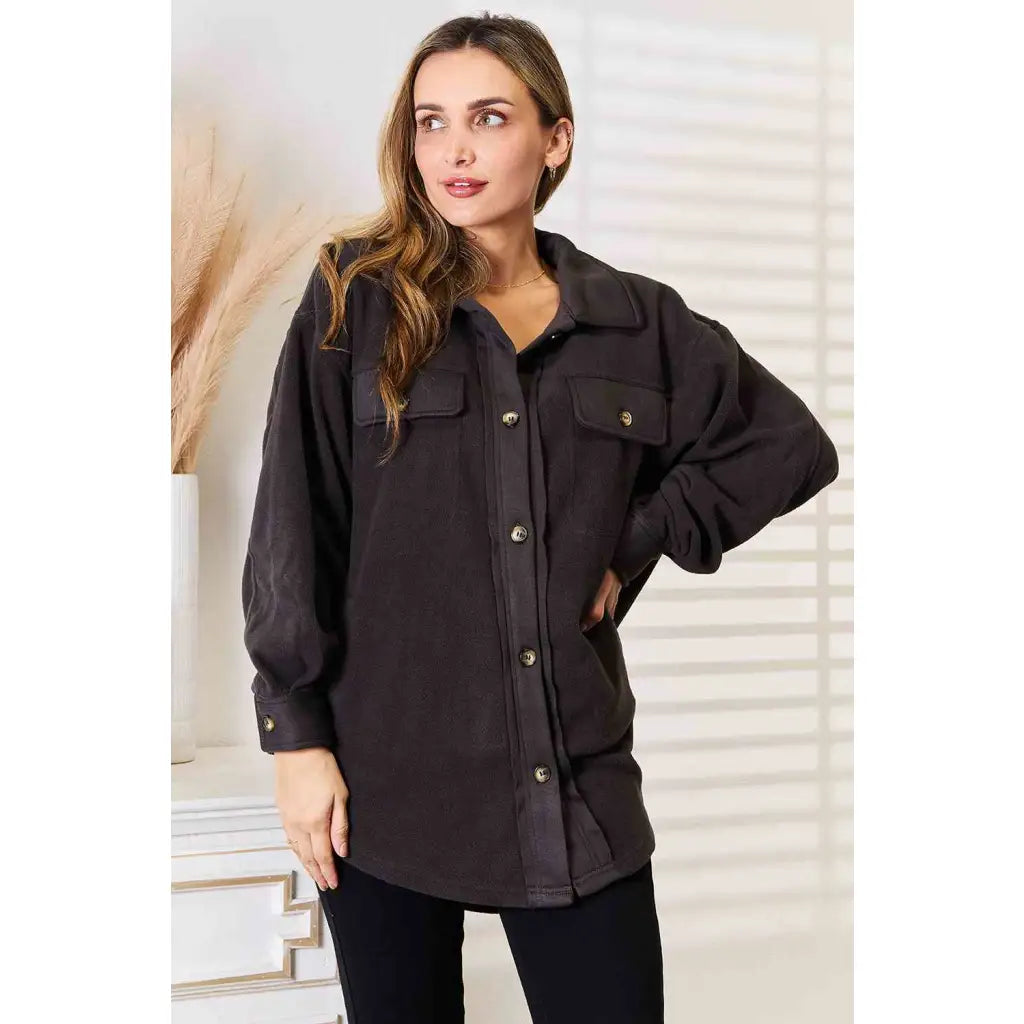 Our Cozy Girl Shacket in Charcoal features a unique tunic detail front and side pockets trendy long puff sleeves.