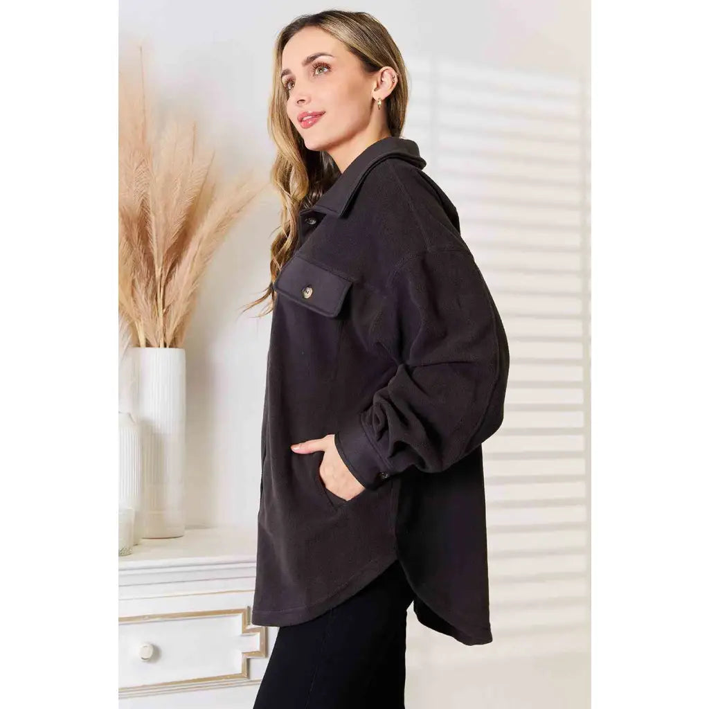 Our Cozy Girl Shacket in Charcoal features a unique tunic detail front and side pockets trendy long puff sleeves.
