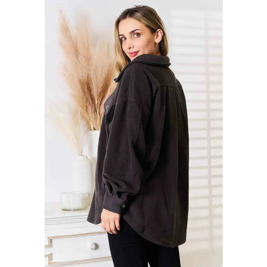 Our Cozy Girl Shacket in Charcoal features a unique tunic detail front and side pockets trendy long puff sleeves.