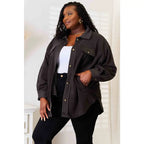 Our Cozy Girl Shacket in Charcoal features a unique tunic detail front and side pockets trendy long puff sleeves.