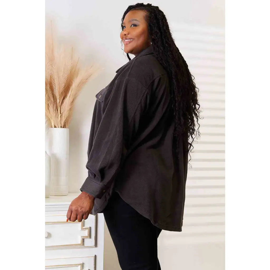 Our Cozy Girl Shacket in Charcoal features a unique tunic detail front and side pockets trendy long puff sleeves.