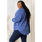 Our Cozy Girl Shacket in Dusty Blue features a unique tunic detail front and side pockets trendy long puff sleeves.