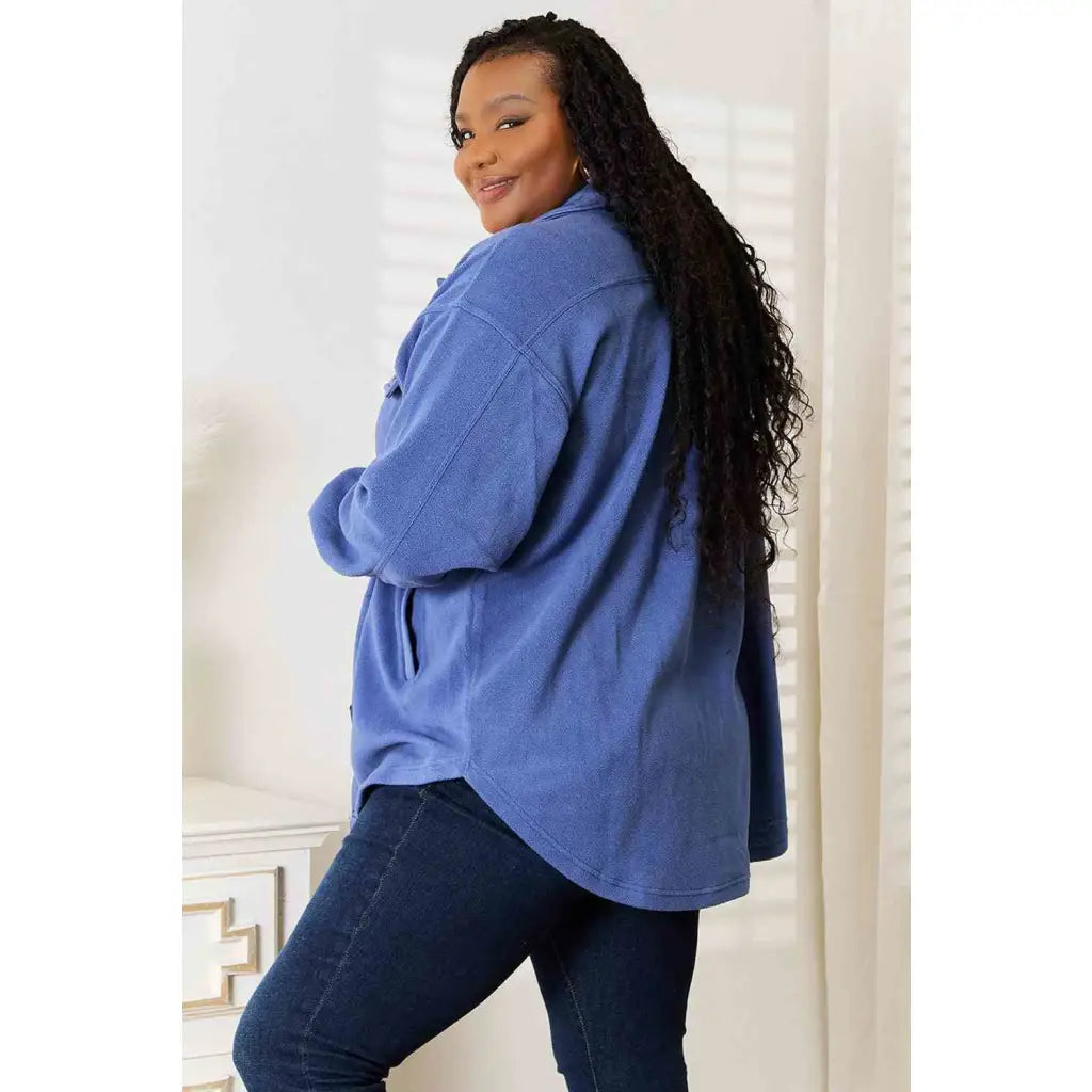 Our Cozy Girl Shacket in Dusty Blue features a unique tunic detail front and side pockets trendy long puff sleeves.