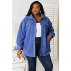 Our Cozy Girl Shacket in Dusty Blue features a unique tunic detail front and side pockets trendy long puff sleeves.