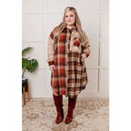 Oversized plaid shacket in soft flannel with side pockets and plus size fit. Fall-ready a scooped hem. Ships 2 to 3