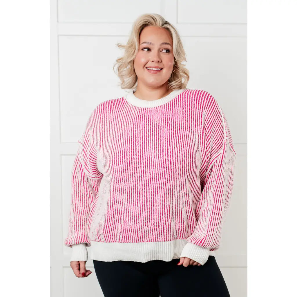 Our Cozy Oversized Contrast Trim Sweater in Pink and White features a textured knit banded ribbed details on the round