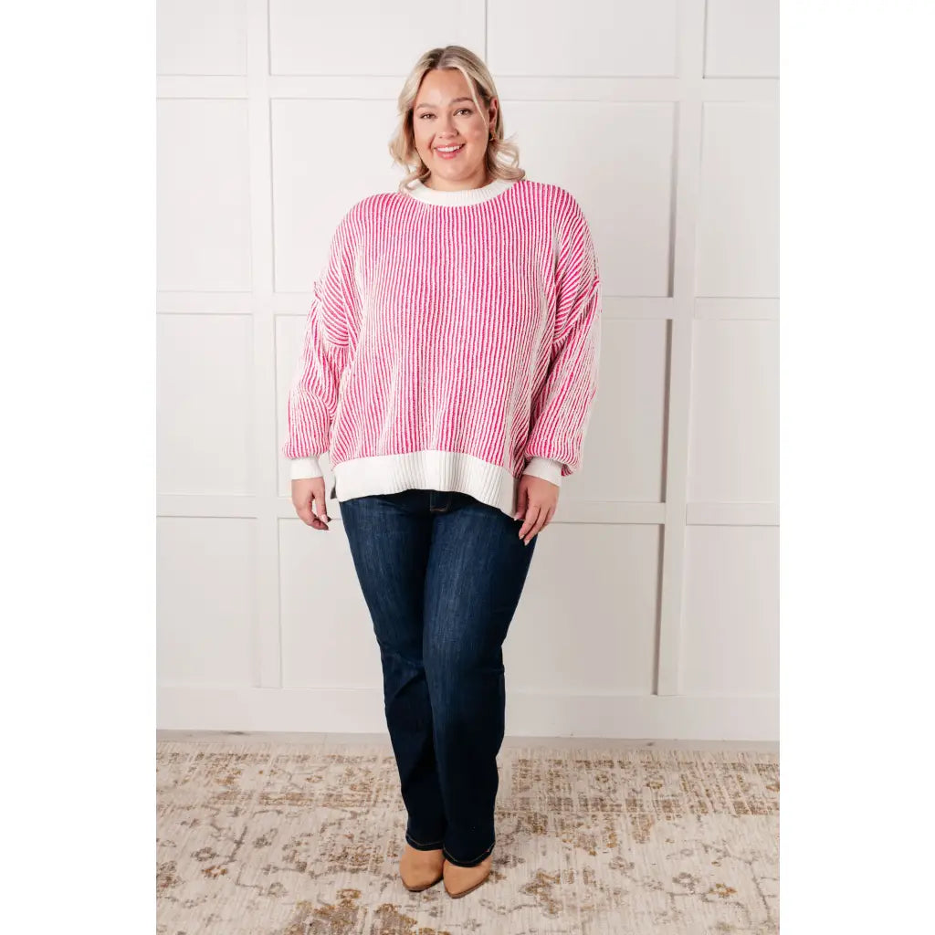 Our Cozy Oversized Contrast Trim Sweater in Pink and White features a textured knit banded ribbed details on the round