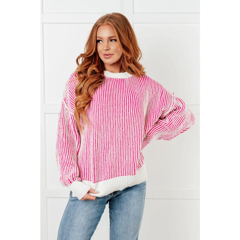 Our Cozy Oversized Contrast Trim Sweater in Pink and White features a textured knit banded ribbed details on the round