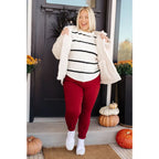 Stay cozy and chic with our Cuddly Sherpa Coat in Cream. Soft fleece jacket perfect for layering on chilly days.