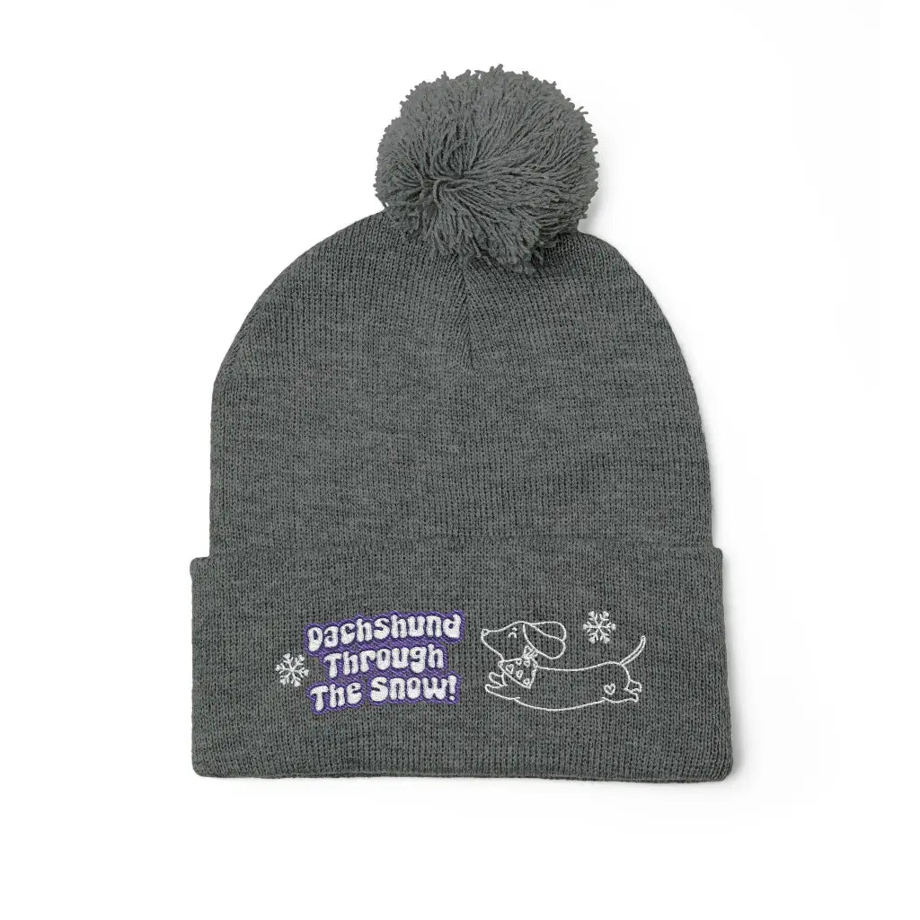 Cozy embroidered beanie with dachshund art by Sweet Roo Bou. A playful winter hat in six colors for dog lovers and fun