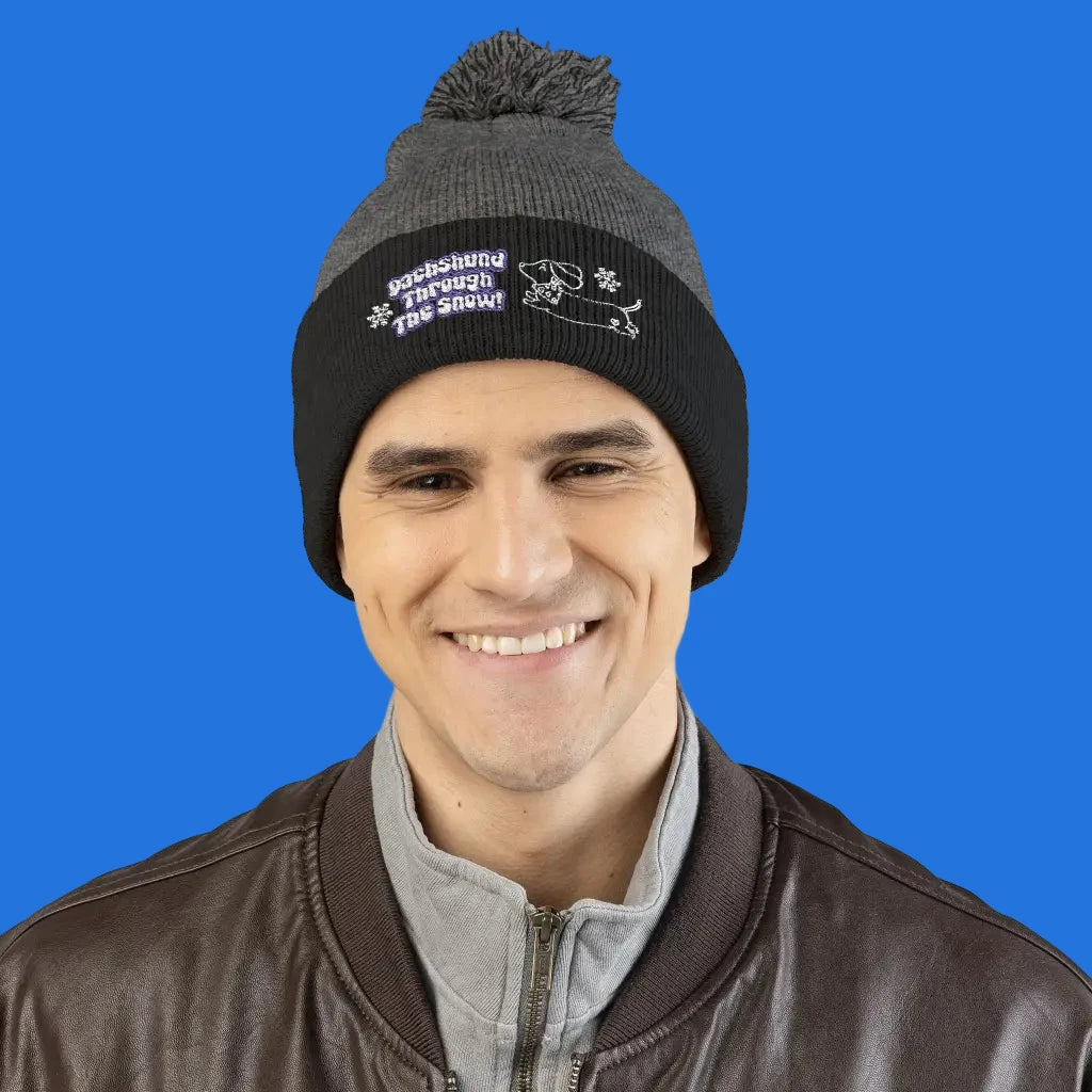 Cozy embroidered beanie with dachshund art by Sweet Roo Bou. A playful winter hat in six colors for dog lovers and fun