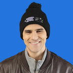 Cozy embroidered beanie with dachshund art by Sweet Roo Bou. A playful winter hat in six colors for dog lovers and fun