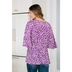 Look stylish in our Dearest Dreamer Peplum Top Painted Purple. Crafted from beautifully printed and easy to wear