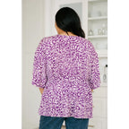 Look stylish in our Dearest Dreamer Peplum Top Painted Purple. Crafted from beautifully printed and easy to wear