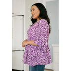 Look stylish in our Dearest Dreamer Peplum Top Painted Purple. Crafted from beautifully printed and easy to wear